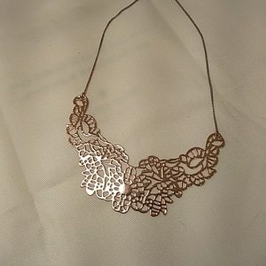 Rose gold colored necklace